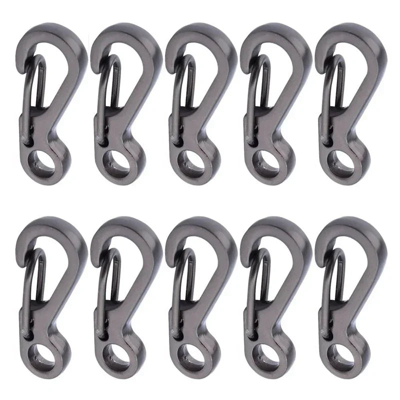 Ten gray metal carabiners arranged in two rows on a white background