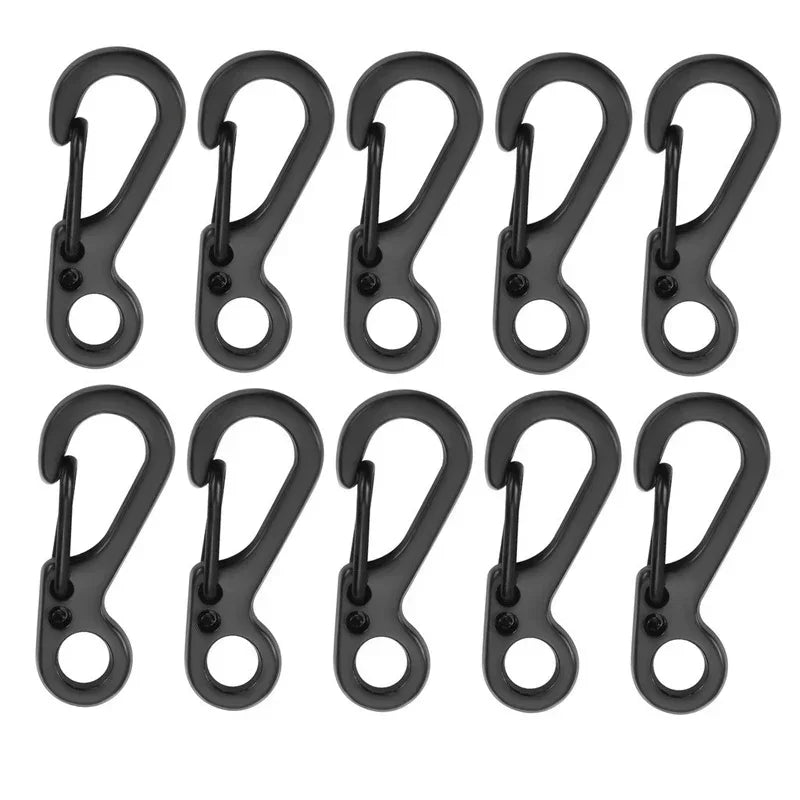 Set of black carabiners on a white background