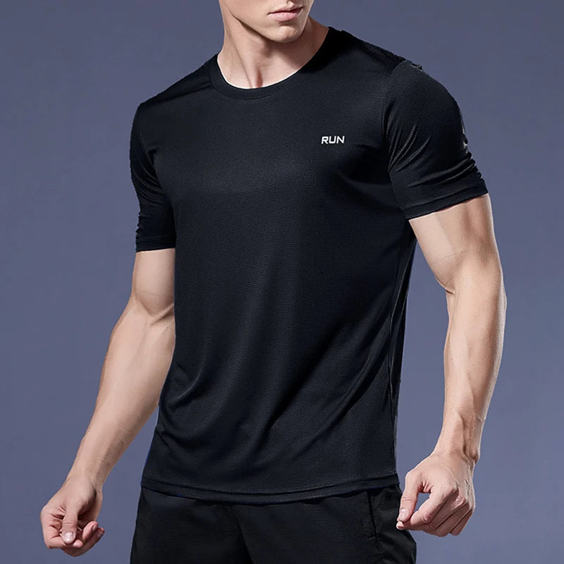 Person wearing a black athletic shirt with 'RUN' text on a dark background