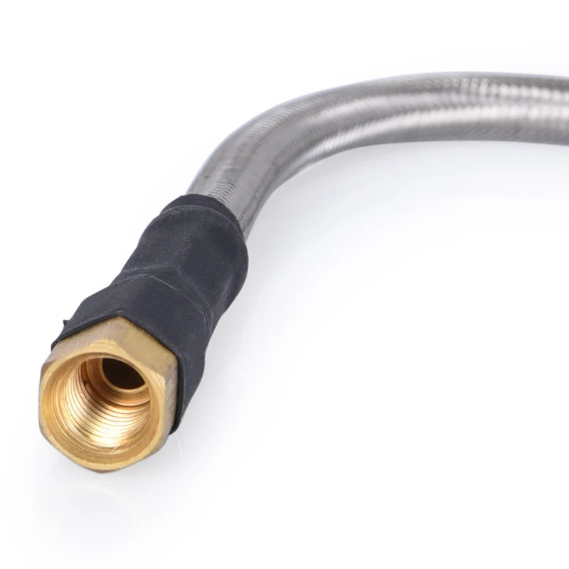 Metal hose with brass fitting on a white background