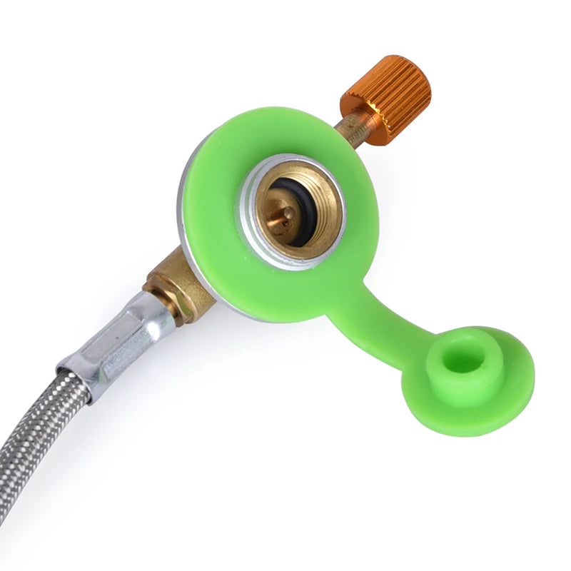 Green and gold shower head with flexible hose on a white background