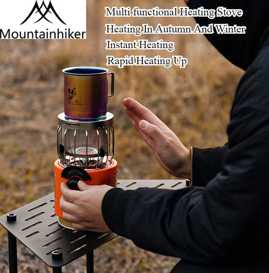 Person using a multi-functional heating stove with a colorful mug outdoors.