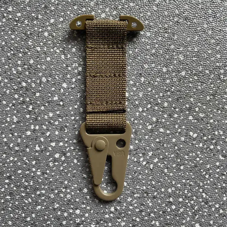Brown webbing strap with clip on a gray textured background
