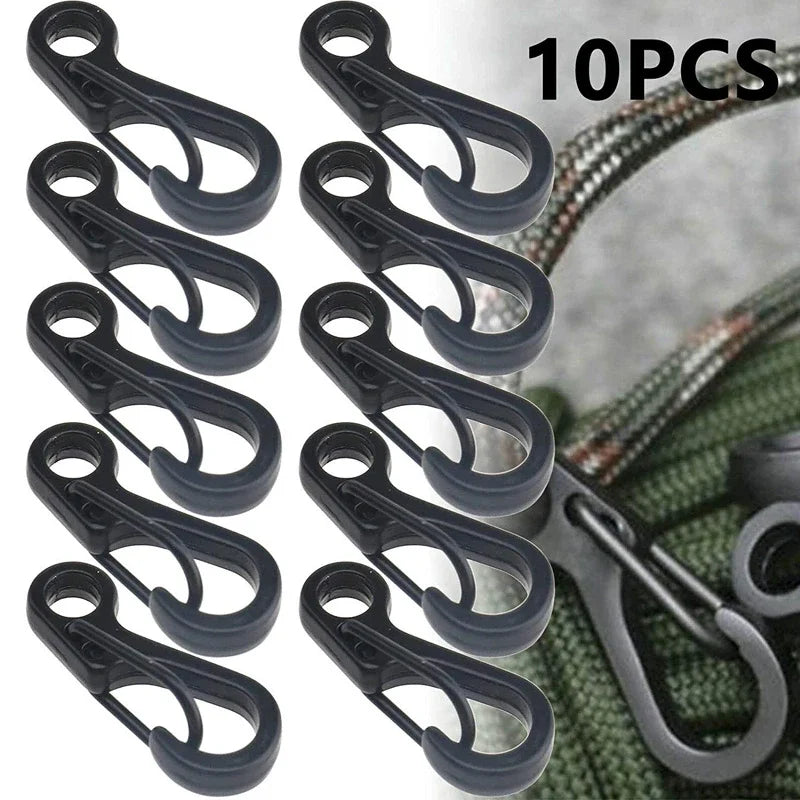 Set of 10 black carabiners with a blurred background