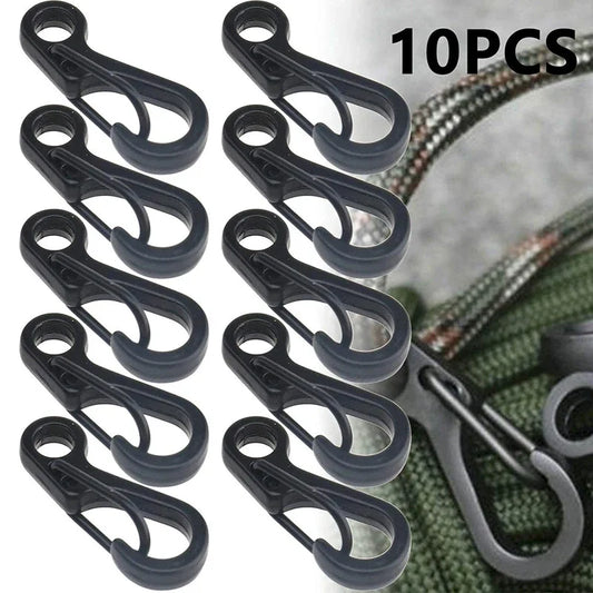 Set of 10 black carabiners with a blurred background