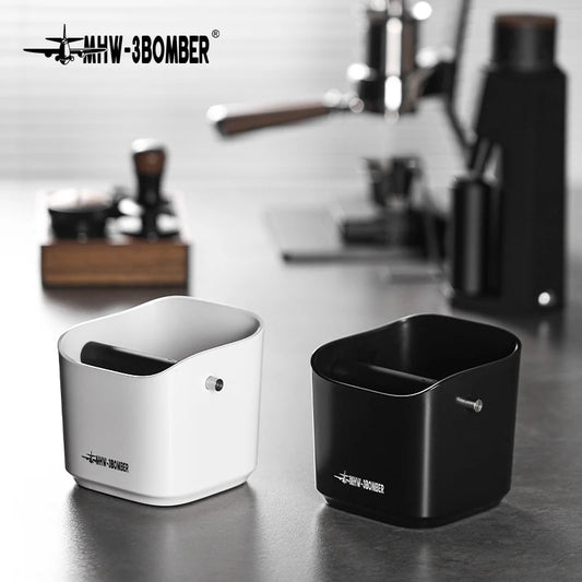 Two black and white containers on a reflective surface with 'MHW-3BOMBER' branding.