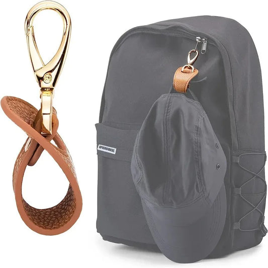 Gray backpack with a cap pocket and keychain clip on a white background