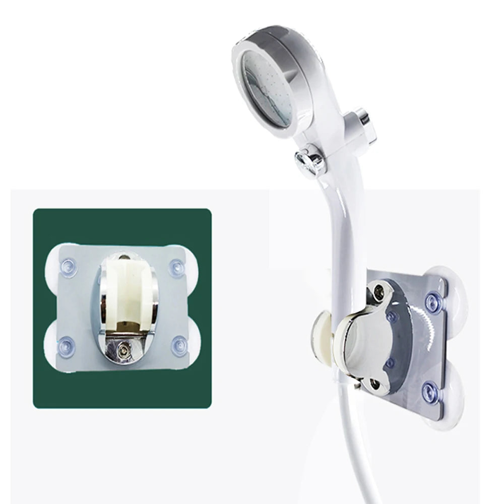 Chrome shower head and control panel on a white background