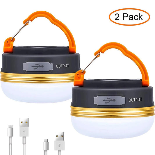 Two camping lanterns with USB charging cable on a white background