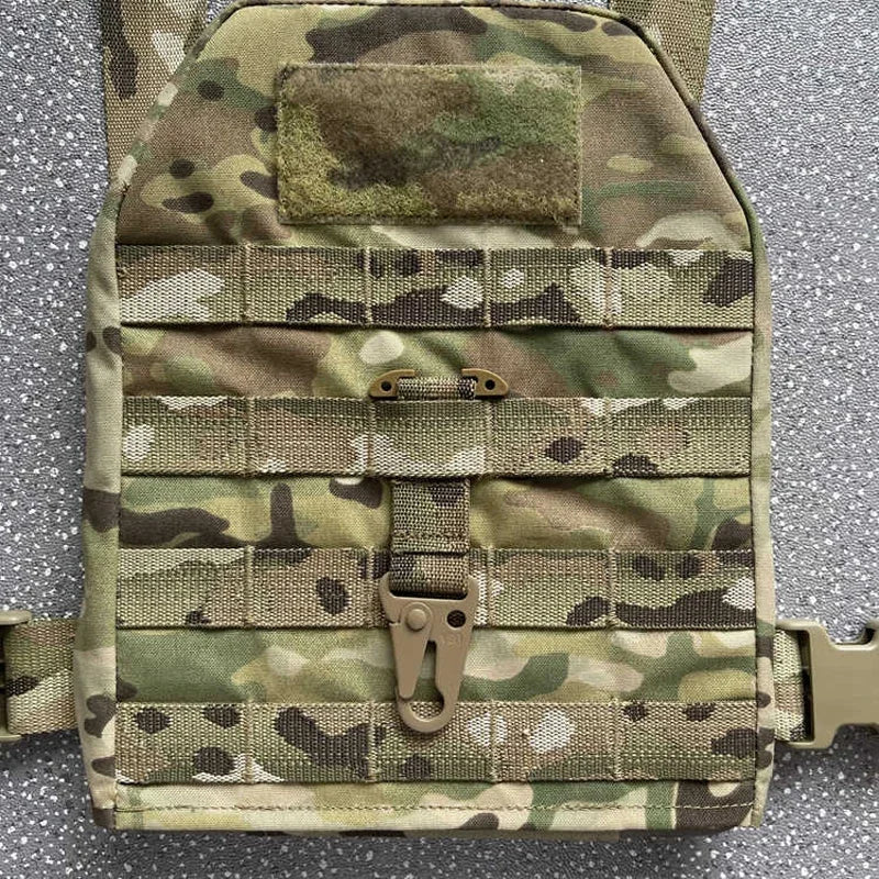 Camouflage tactical pouch on a gray background